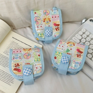 Set di 3 mini portamonete con cartoni animati colorati e bottoni con trama a quadri