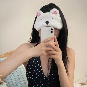 Cute white plush Westie dog sleep mask with pink checkered ears for travel and relaxation