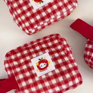 Red and white checkered plush makeup bag featuring cute Hello Kitty design with handle