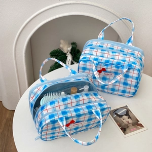 Three-layer bow checkered makeup bag with large capacity and portable handle