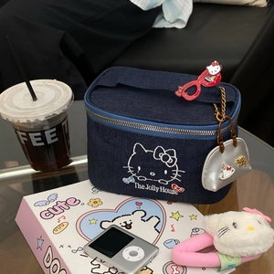 Blue denim makeup bag with cat embroidery, top handle and decorative metal charms