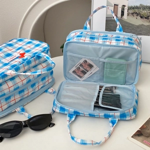 Three-layer checkered cosmetic bag with bow handle and multi-compartment interior storage