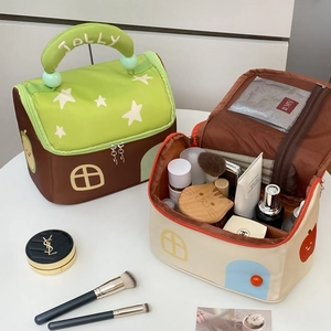 Creative house-shaped makeup bag with large capacity and portable handle design