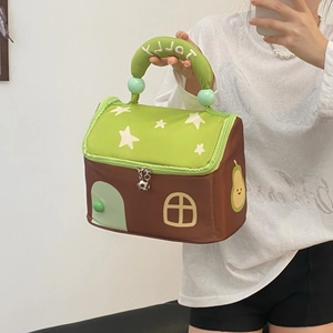 Detail of creative house-shaped cosmetic bag with star prints and flower zipper puller