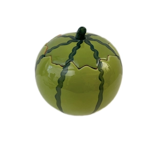 Creative watermelon-shaped ceramic storage jar with vibrant green glossy glaze finish