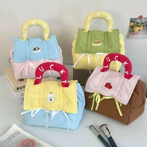 Quilted cosmetic bags with LUCKY handles in four colors and cute cartoon embroidery