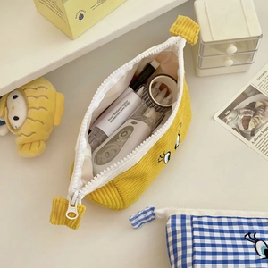 Cute banana-shaped corduroy pencil case with large capacity and white zipper closure