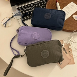 Lot de pochettes en tissu à trois fermetures éclair en bleu, violet et vert