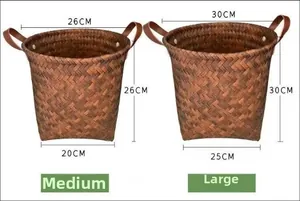 Close-up of woven laundry basket with brown leather handles and size specifications