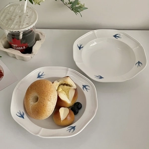 Japanese style ceramic plates with embossed swallow pattern and scalloped edges