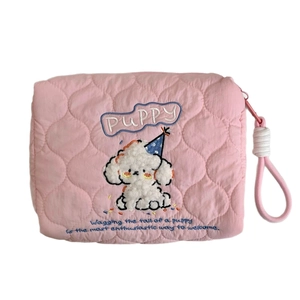Pink quilted makeup bag featuring cute puppy embroidery and portable wristlet handle
