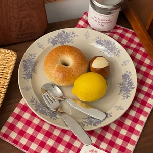 Retro ceramic dinner plate with blue camellia floral pattern and elegant cream finish