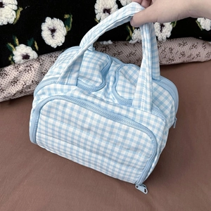 Blue checkered quilted cosmetic bag with large capacity and portable handle for travel