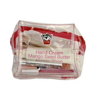 Transparent PVC cosmetic bag with cute koala patch and red zipper for makeup storage