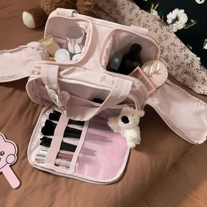 Pink large capacity travel makeup bag with brush slots and cute bear pendant