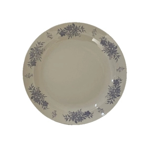 Retro blue floral ceramic plate with a minimalist round design for dinner or afternoon tea