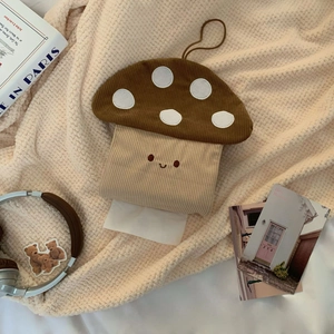 Detail of mushroom tissue box holder with corduroy fabric and cute embroidery