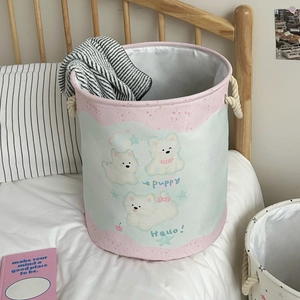Collapsible pink and blue laundry basket with cute puppy prints and rope handles