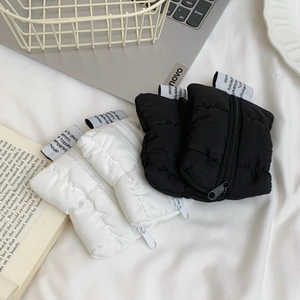 Quilted cloud mini coin pouches in black and white colors with top zipper closure