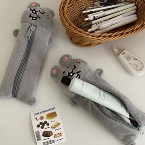 Detail of grey plush animal pencil case showing soft texture and spacious interior