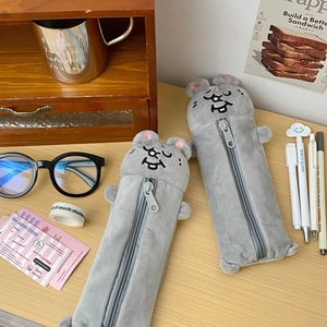 Close-up of cute grey plush mouse pencil cases with soft texture and front zipper