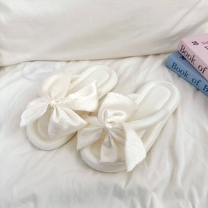 White silk satin flip-flops with large bow design on soft thick sole for summer wear