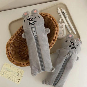 Cute gray plush mouse-shaped stationery bags in a decorative basket for students