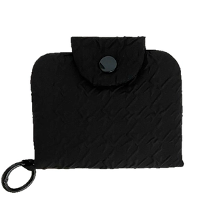 Minimalist black pleated coin purse with metal ring hook and snap closure on white background