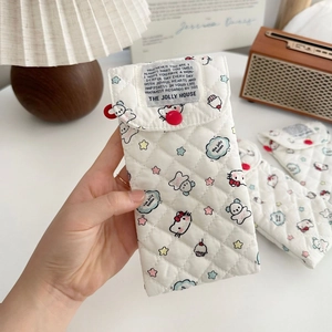 Detailed view of padded quilted cotton cartoon cat glasses pouch with red button closure