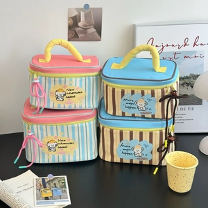 Set of four striped cosmetic bags with cute bear illustrations and sturdy handles