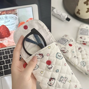 Padded white quilted sunglasses pouch with cartoon kitty motif and red snap button