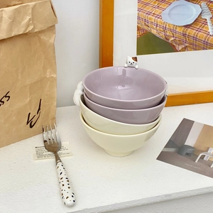 Detailed view of high-quality purple ceramic cat bowl with embossed 3D kitten motif