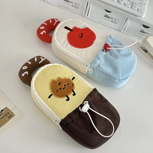 Detail of cute canvas pencil case with drawstring base and Jolly embroidered handle