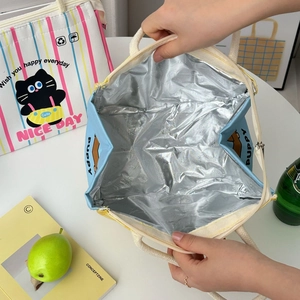 Spacious interior of blue insulated lunch bag with thick aluminum foil lining