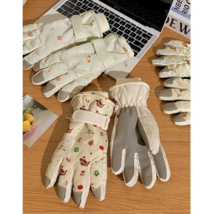 Detail of winter ski gloves with adjustable velcro strap and non-slip palm material