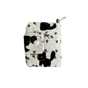 Cute kitten bow tie coin purse with portable hook and snap closure on white background