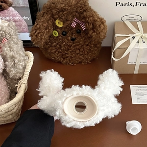 Detailed view of the Teddy dog plush water bag showing the secure plastic screw cap seal