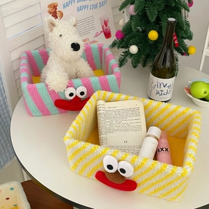 Striped fleece storage baskets with cute clown face embroidery for desktop organization