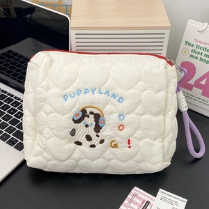 Detailed quilted makeup bag with heart patterns and puppy embroidery for organization