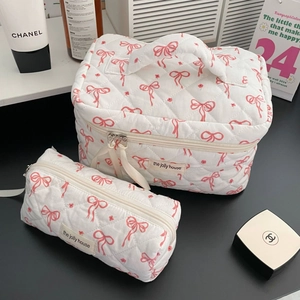 Quilted floral bow makeup bag set with large vanity case and small zipper pouch