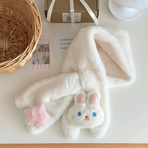 Detailed view of white faux fur scarf with cute plush bunny and pink star decoration