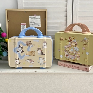 Close-up of cute cartoon portable suitcases with animal illustrations and striped texture