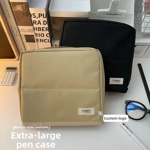 Detail view of the Canvas Campus MOKA makeup pouch in Khaki and Black minimalist style