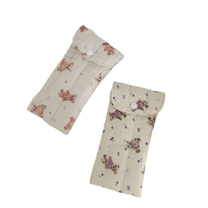 Quilted cartoon bear sunglasses pouch with soft padded fabric and button closure