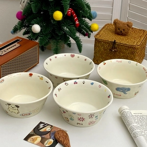 Set of four cute ceramic yogurt bowls with hand-drawn cartoon dog and elephant patterns