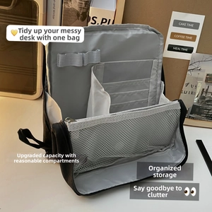 Detail view of large capacity makeup bag with multi-layer compartments and mesh pocket