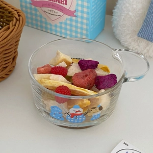 Christmas snowman glass salad bowl with handle filled with assorted dried fruits