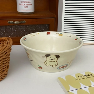 Detail of a ceramic bowl featuring cute cartoon puppy and dessert hand-drawn illustrations