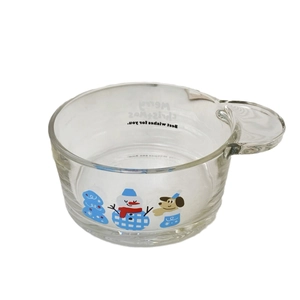Christmas snowman glass bowl with side handle featuring festive holiday illustrations