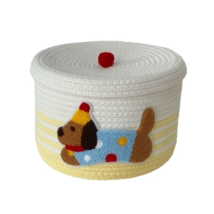 Puppy cotton rope storage basket with lid, featuring woven stripes and red pompom